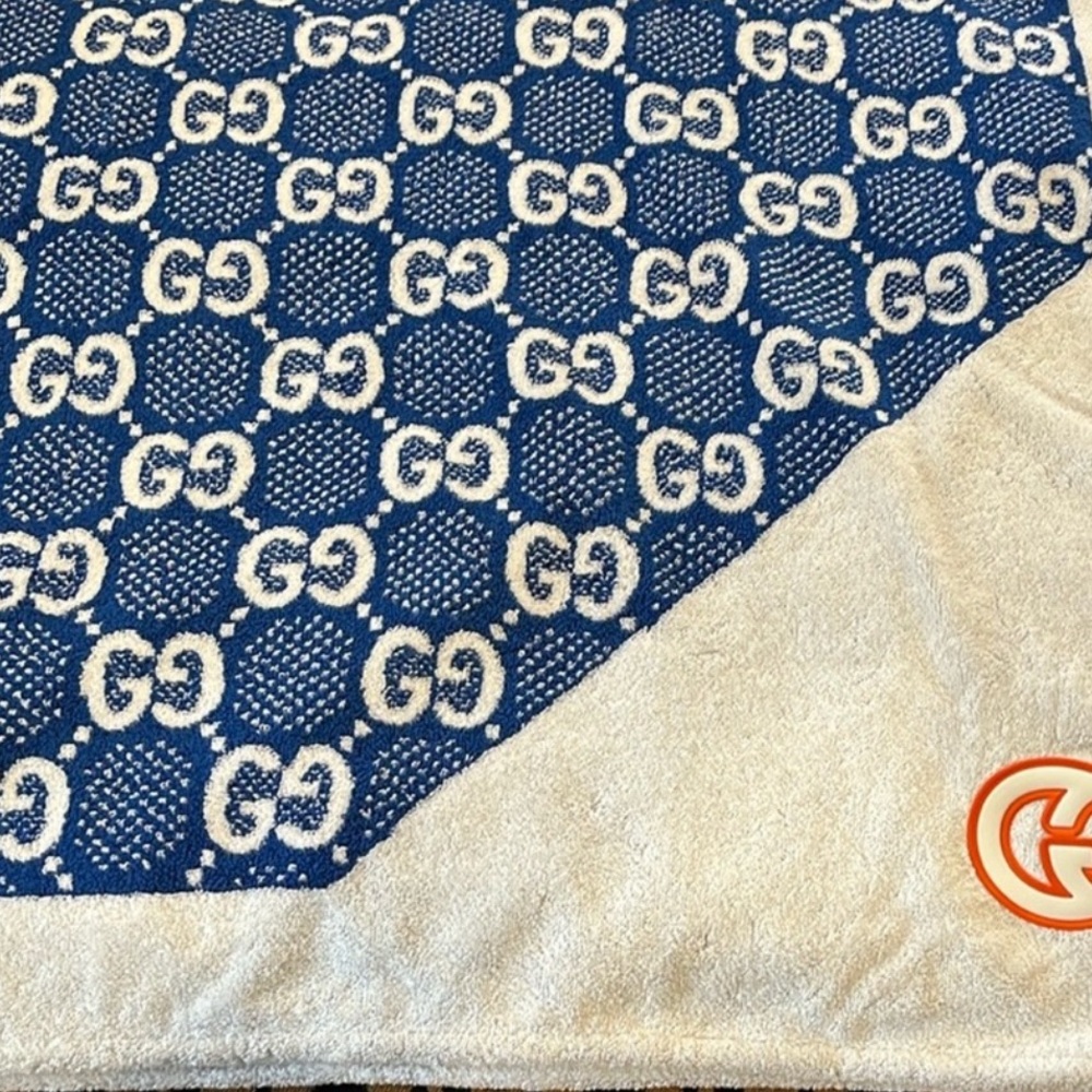 Gucci Luxury Blue and Cream bath can be used as a throw